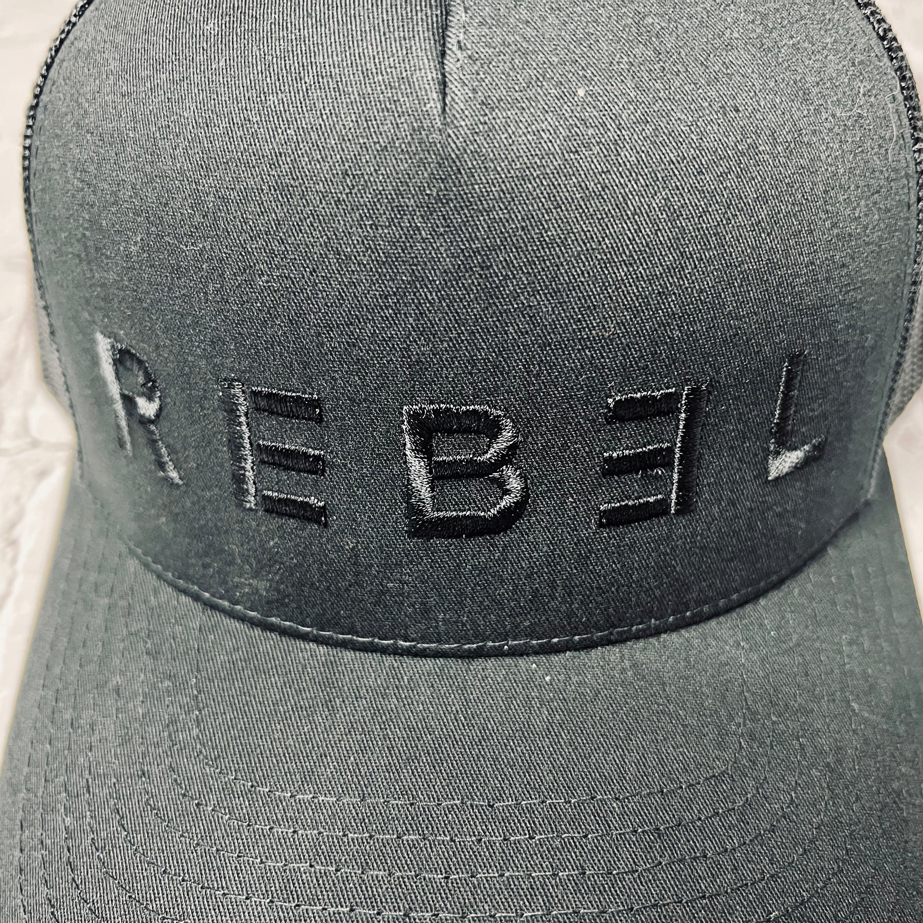 Black on Black REB3L Logo Trucker Hat